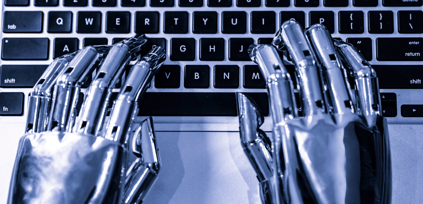 Silver Robotics hands on laptop keyboard